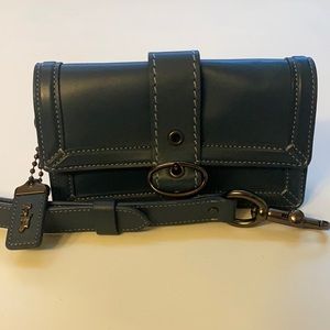 Teal leather mini bag with chunky hardware